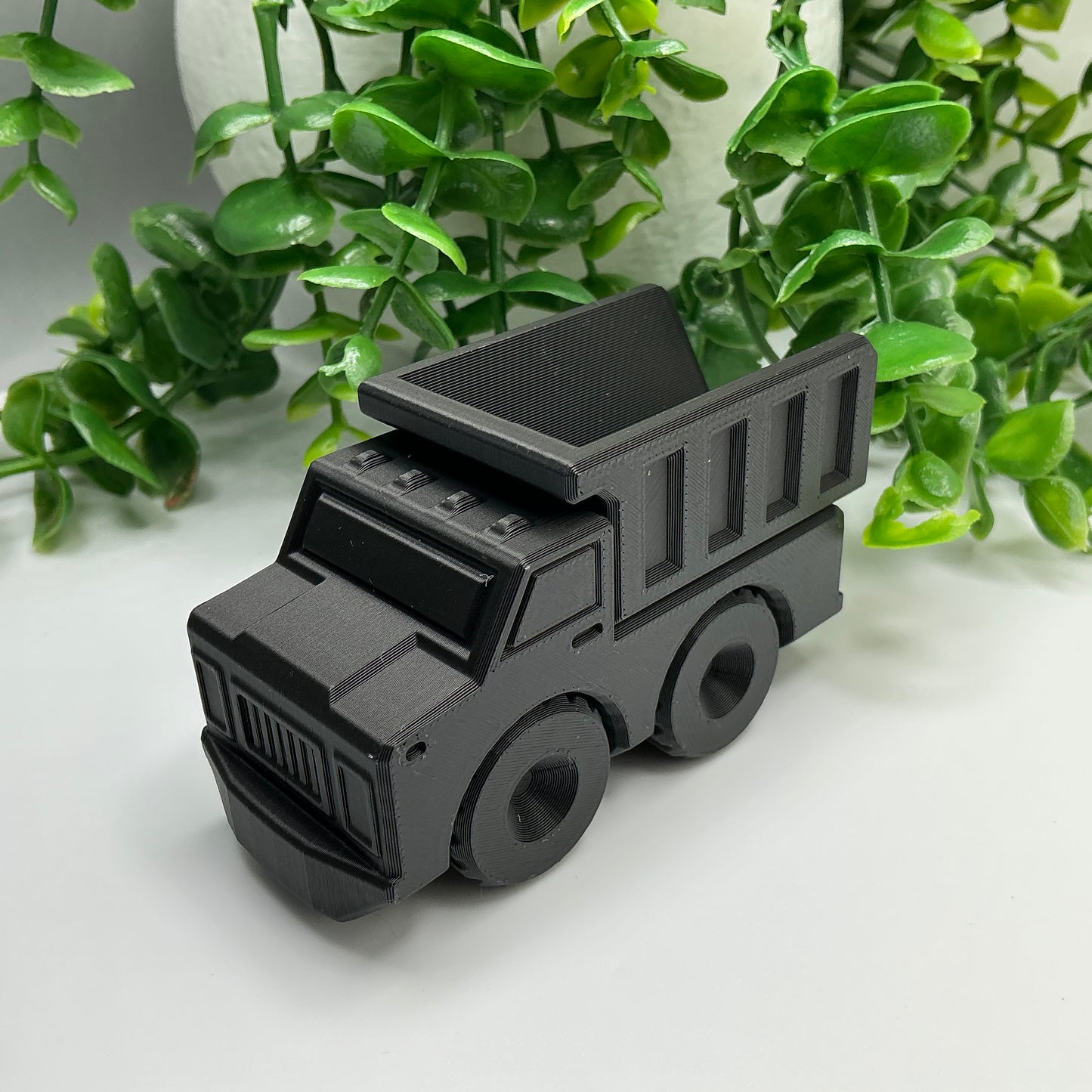 Dump Truck Construction Vehicle Articulated Durable Hauler Work Truck - close-up detail